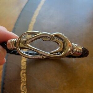 Black woven bracelet with magnetic heart clasp